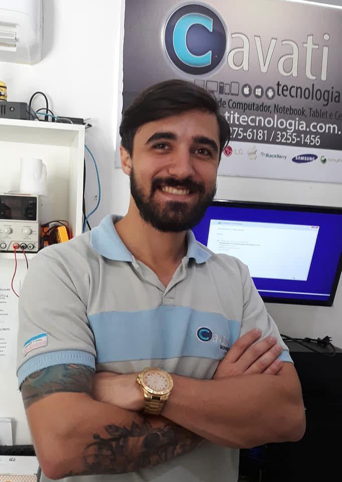 Foto de André na loja